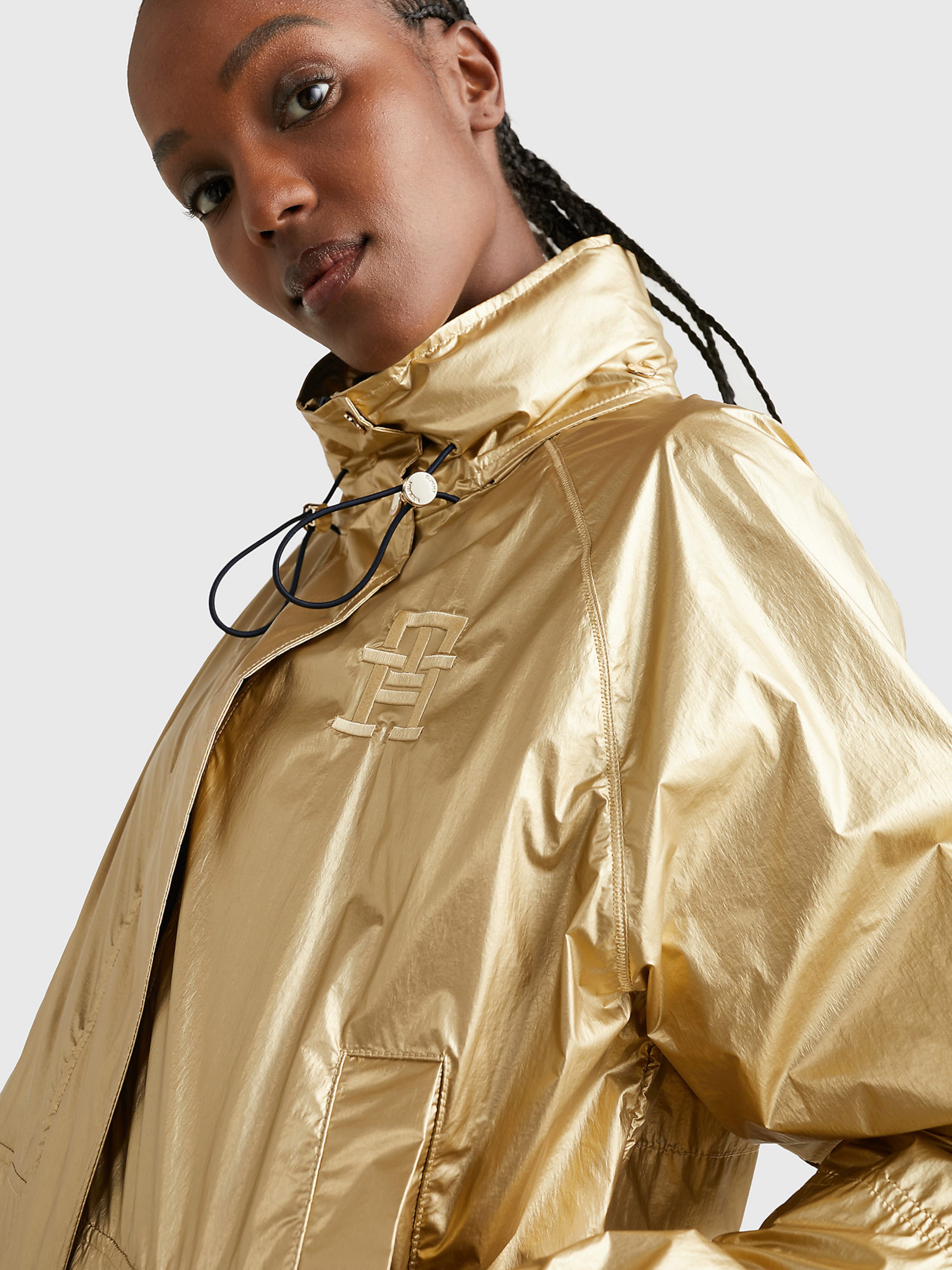 TOMMY HILFIGER Between Season Jacket in Gold ABOUT YOU