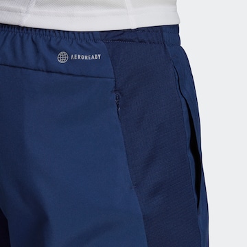 regular Pantaloni sportivi 'Own The Run' di ADIDAS SPORTSWEAR in blu