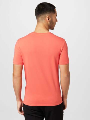 GUESS - Camiseta en naranja