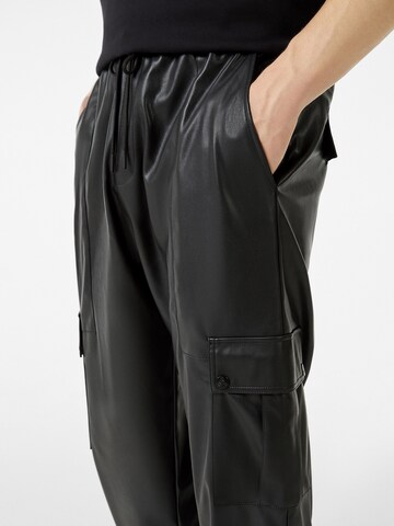 Bershka Tapered Cargo trousers in Black