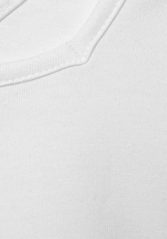 T-shirt LASCANA en blanc