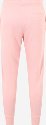 Tapered Pantaloni di Nike Sportswear in rosa