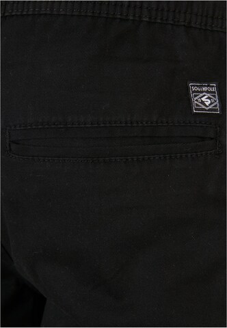 Tapered Pantaloni cargo di SOUTHPOLE in nero