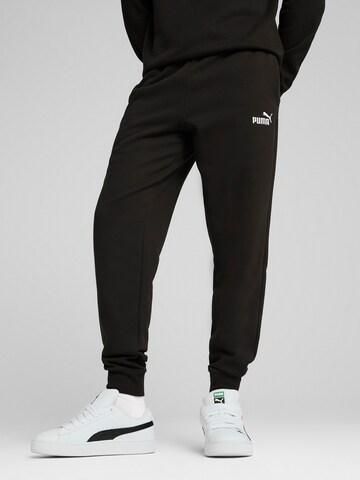 Tapered Pantaloni sportivi 'ESS No. 1' di PUMA in nero: frontale