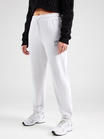 Tapered Pantaloni 'CARDAZE' di ONLY Carmakoma in grigio: frontale