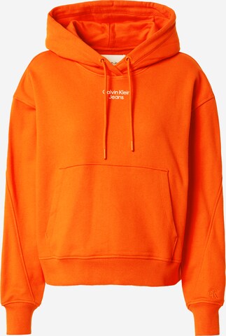 Sweat-shirt Calvin Klein Jeans en orange : devant