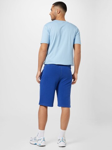 Champion Authentic Athletic Apparel Loosefit Shorts in Blau