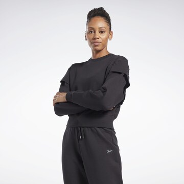 Sweat de sport Reebok en noir : devant