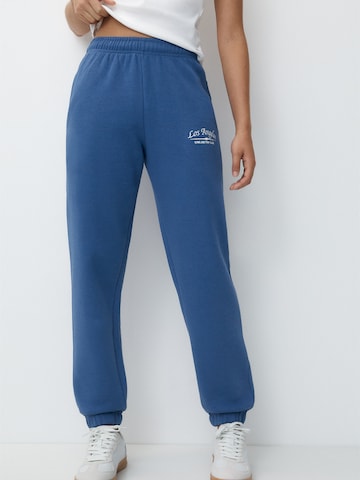 Pull&Bear Tapered Trousers in Blue: front