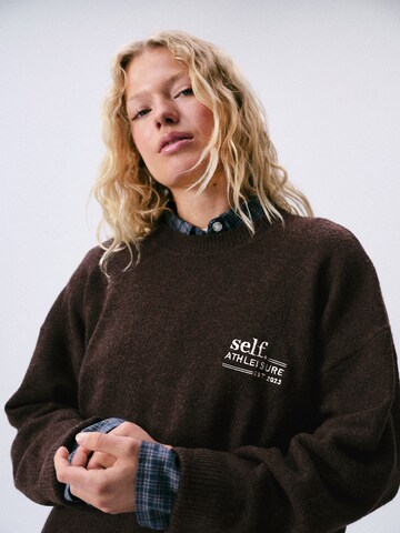 self. - Jersey en marrón