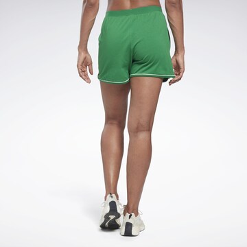 Reebok Normalny krój Spodnie sportowe w kolorze zielony