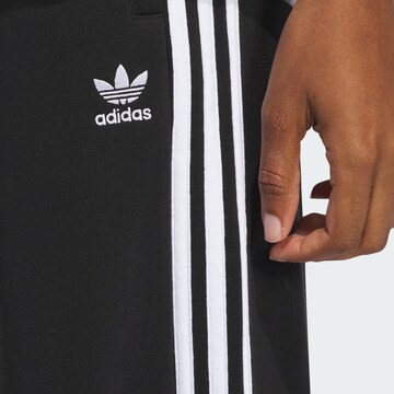 ADIDAS ORIGINALS Wide leg Trousers in Black