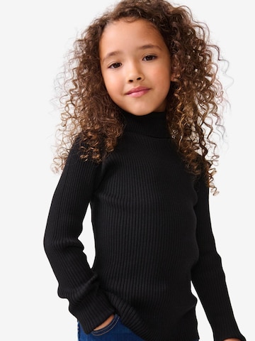 Next Sweater in Black: front