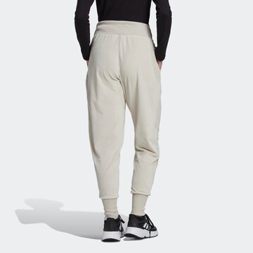 ADIDAS SPORTSWEAR Tapered Workout Pants 'Holidayz Cozy Velour' in Beige