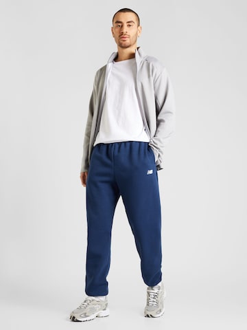 Tapered Pantaloni di new balance in blu