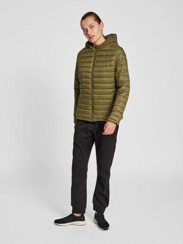 Veste d’hiver Hummel en vert