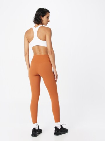 NIKE Skinny Sportovní kalhoty 'ZENVY' – oranžová