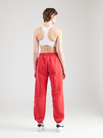 Nike Sportswear Zúžený Kalhoty – červená