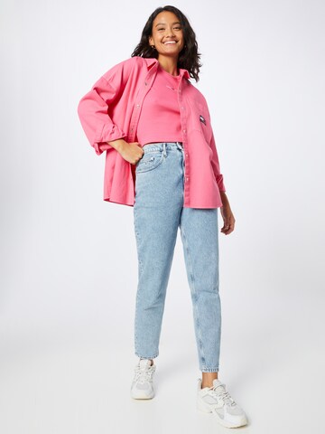 Top di Tommy Jeans in rosa