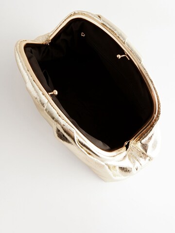 Pochette Next en or