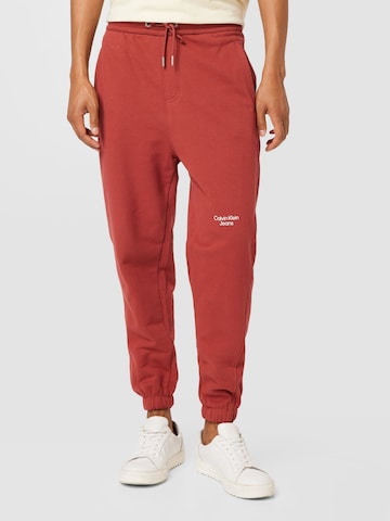 Calvin Klein Jeans Alt kitsenev Püksid, värv pruun: eest vaates