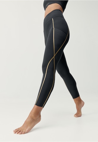 Regular Leggings 'Gold' Born Living Yoga en noir