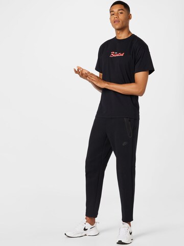 Tricou funcțional de la NIKE pe negru