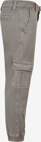 Tapered Pantaloni di Urban Classics in grigio