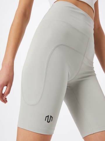 Skinny Pantaloni sportivi 'Naka' di MOROTAI in grigio