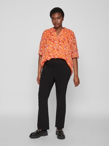 EVOKED - Blusa 'Falia' en naranja