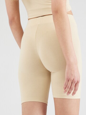 Skinny Pantaloni 'SUKI CYCLIST' di HUGO in beige