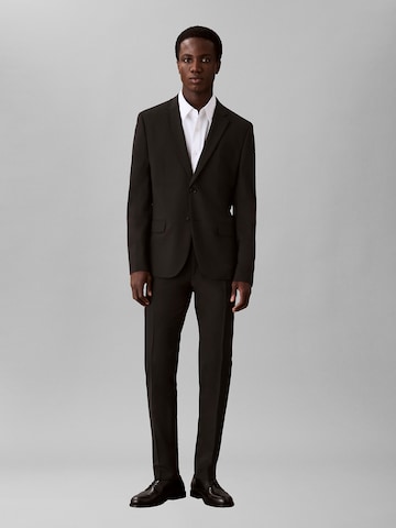 Coupe slim Pantalon à plis Calvin Klein en noir