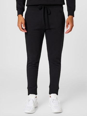 Effilé Pantalon WESTMARK LONDON en noir : devant