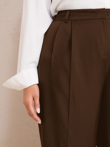 ruda Friends Like These Plačios klešnės Klostuotos kelnės