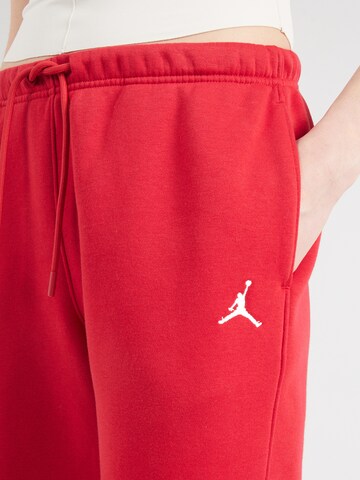 Tapered Pantaloni 'BRKLN FLC' di Jordan in rosso