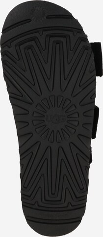 Sandalo con cinturino 'GOLDENSTAR HERITAGE BRAID' di UGG in nero