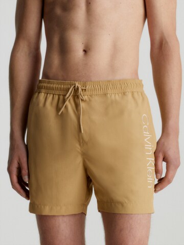 Calvin Klein Swimwear Kratke kopalne hlače | bež barva: sprednja stran