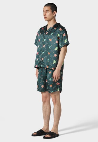 Pas De Monaco Regular Hose 'FRUIT MONOGRAM' in Grün