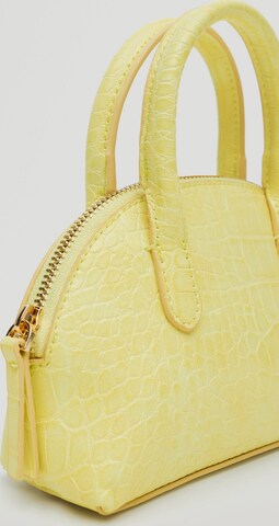MANGORučna torbica 'SHELL' - žuta boja: prednji dio