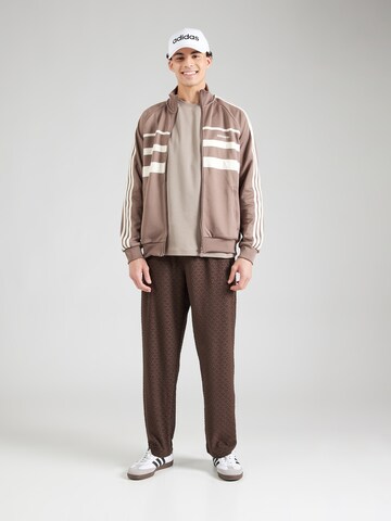 Loosefit Pantaloni di ADIDAS ORIGINALS in marrone