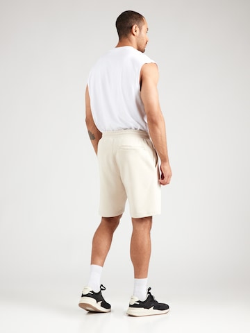 TOMMY HILFIGER - regular Pantalón 'ESSENTIAL' en beige