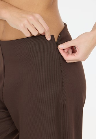 Athlecia Regular Sports trousers 'Franye' in Brown
