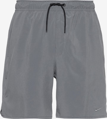 NIKE Workout Pants 'Unlimited' in Grey: front