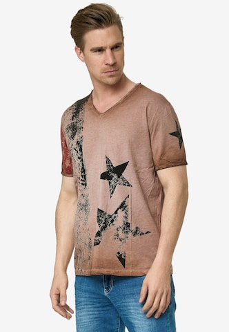 Rusty Neal Cooles T-Shirt mit V-Ausschnitt in Braun: predná strana