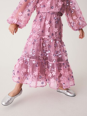 Set Next en rose