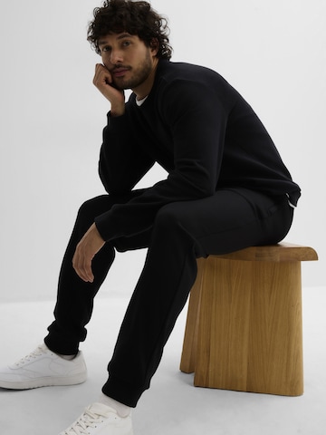 Effilé Pantalon bonprix en noir