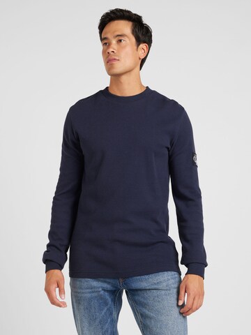 Calvin Klein Jeans T-shirt i blå: framsida