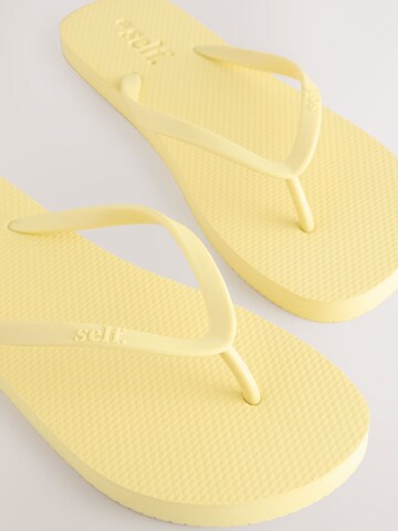 Tongs Next en jaune