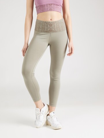 Skinny Pantalon de sport super.natural en gris : devant