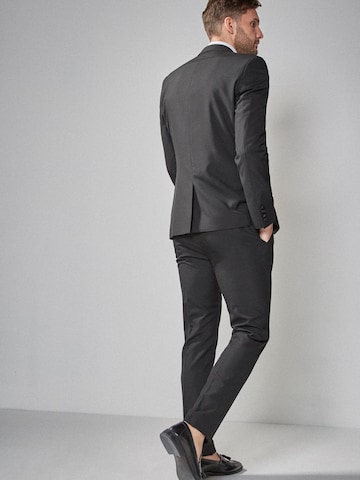 Next Slim Fit Pikkutakki värissä musta